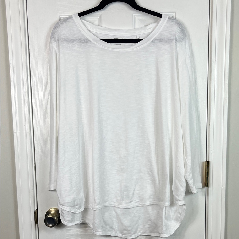 Kirkland signature white 3/4 sleeves tee shirt size XL. Rounded bottom.